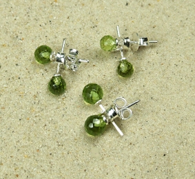 Peridot Ohrsteckerpaar facettiert ca. 4 - 6 mm mit 925 Silber