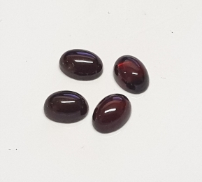 5 x Grant Cabochon oval ca. 5 x 7 mm / ca. 1,0-1,2 ct. / stck
