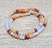 Feueropal Kettenstrang Button facettiert ca. 5,5 - 7,5 mm / ca. 42 cm